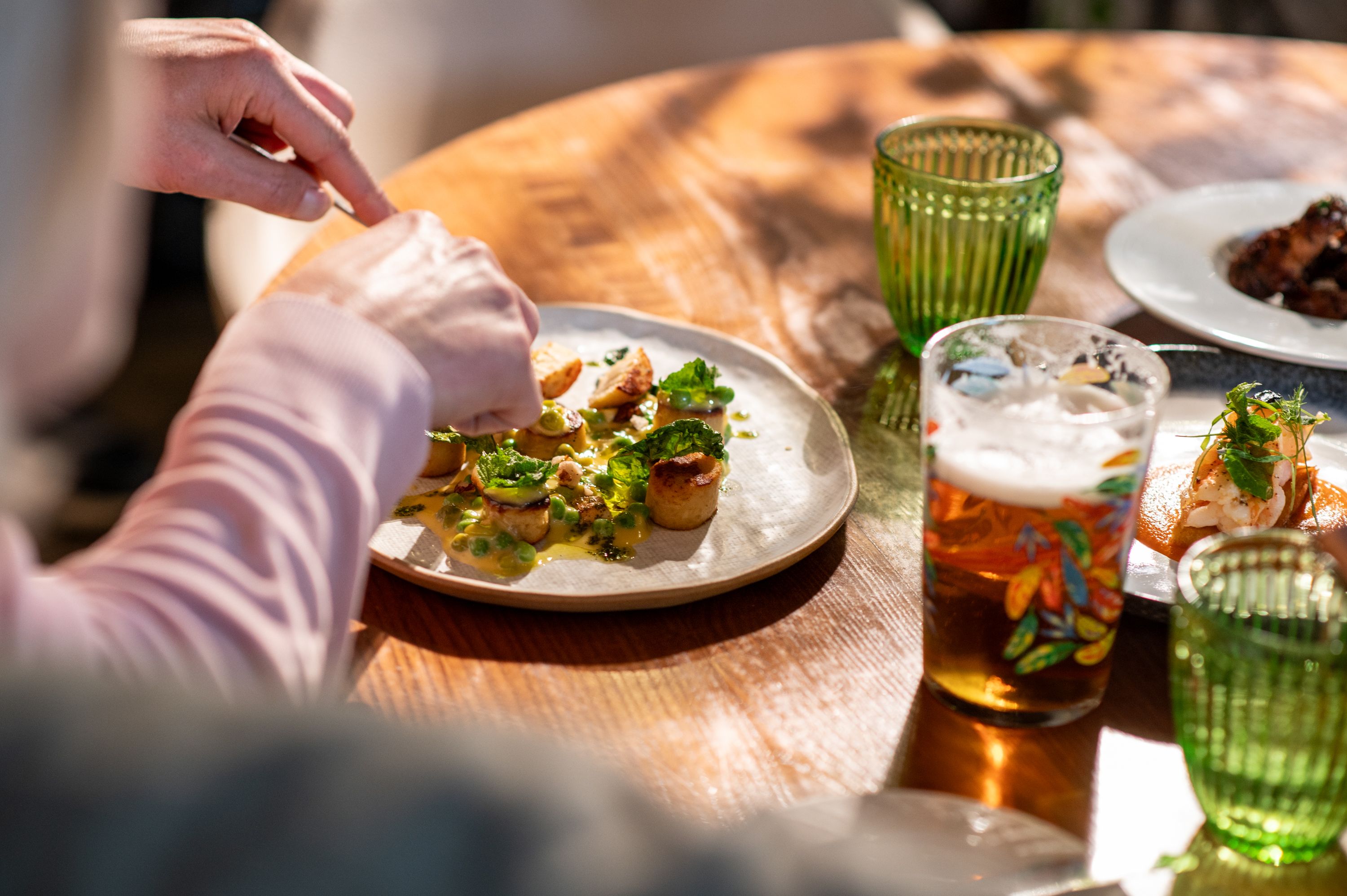 Someone eating a meal at a table