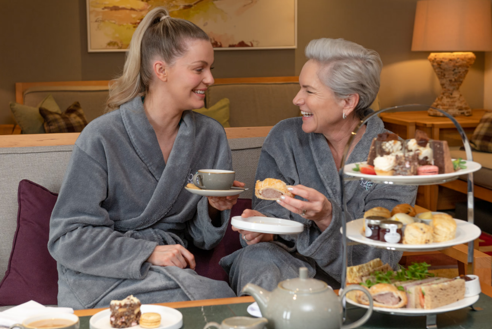 Mother & daughter enjoying afternoon tea in spa